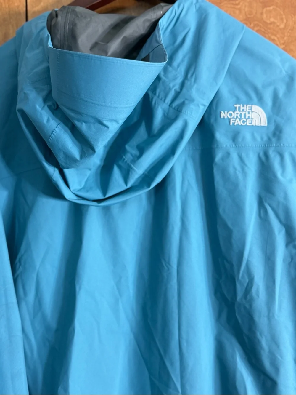 The North Face Men’s Sky Blue Hooded Rain Jacket